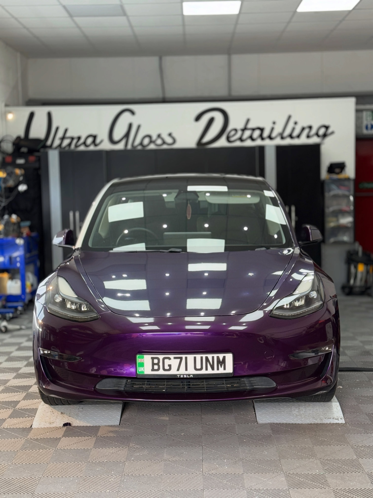 Purple Tesla Model 3 in the Ultra Gloss Detailing studio