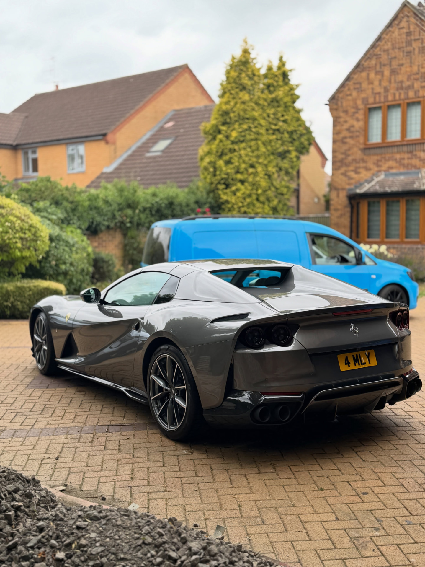Grey Ferrari photographed from the rear
