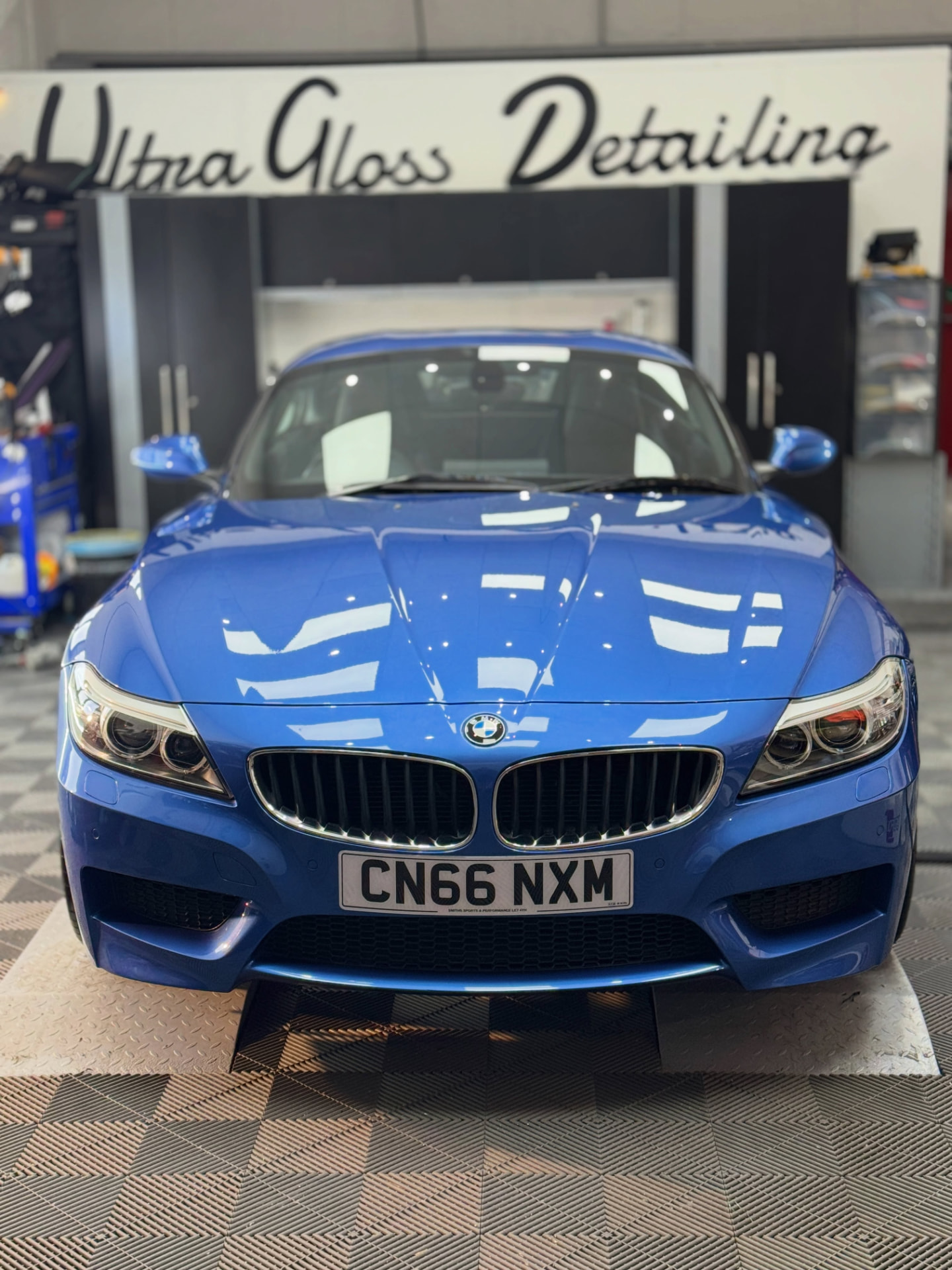 Blue BMW Z4 in the Ultra Gloss Detailing studio